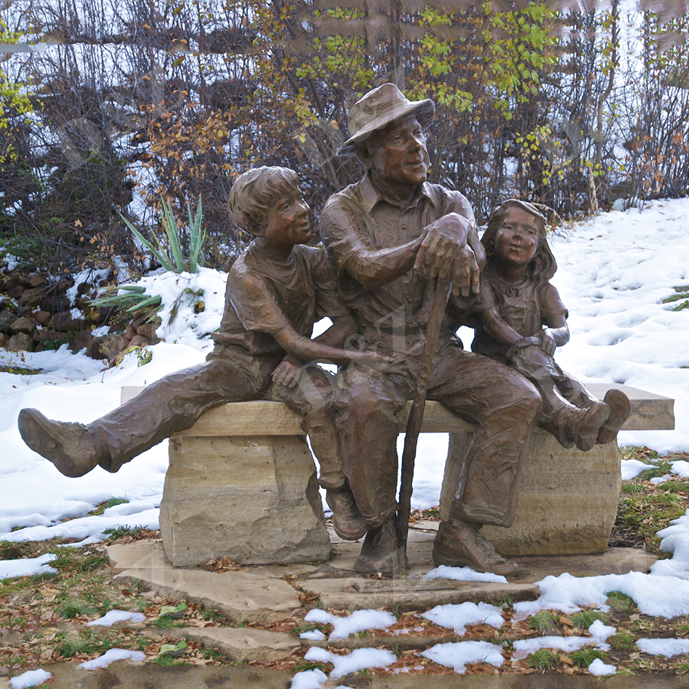 grandfather with boy and girl bronze statues